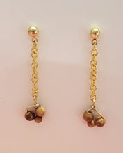 Load image into Gallery viewer, These 2 and 3 mm Mammoth Ivory bead earrings have been crafted from Fossil Mammoth Ivory found in Siberia. Their rich organic color is absorbed from the soil that they have laid in for close to 30,000 years.
