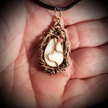 Load image into Gallery viewer, The back of a Copper Wire Wrapped Fossil Walrus Ivory Necklace
