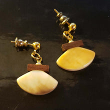 Load image into Gallery viewer, The backside of These delicate little Alaskan Ulu style earrings are handcrafted and Scrimshawed from Fossil Walrus Ivory. The brown handle is Fossil Mammoth Ivory. Artist unknown.
