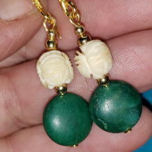 Load image into Gallery viewer, These Turquoise earrings are old. These hand carved mammoth ivory beads are estimated to have been made in the late 1700&#39;s and are highlighted with turquoise flat round beads of unknown origin.
