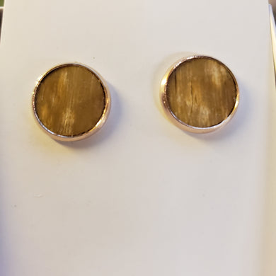 These rose gold post fossil mammoth Ivory earrings are crafted from ivory found in Alaska that is about 25,000 years old.