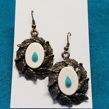 Load image into Gallery viewer, This set of 1.25&quot; Bronze Earrings have been crafted from Fossil Mammoth Ivory that is about 10,000 years old. They are highlighted with real Turquoise cabochons.
