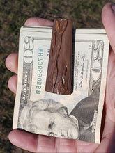 Load image into Gallery viewer, This Money Clip is my first real carving in several years since the loss of my Eyesite. It was a real challenge to accomplish this piece by feel and real great magnification. It is rustic and one of a kind, Hand carved from Alaskan Mammoth Ivory that is about 60,000 years old.  
