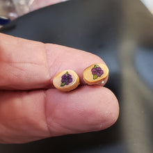 Load image into Gallery viewer, These tiny little Fossil Walrus Ivory Earrings have been hand Scrimshawed by an unknown artist from the middle of the last century. The craftsmanship in this pair has to be seen in person. Amazing work. .25&quot;x.50&quot; in size. Sterling silver posts.
